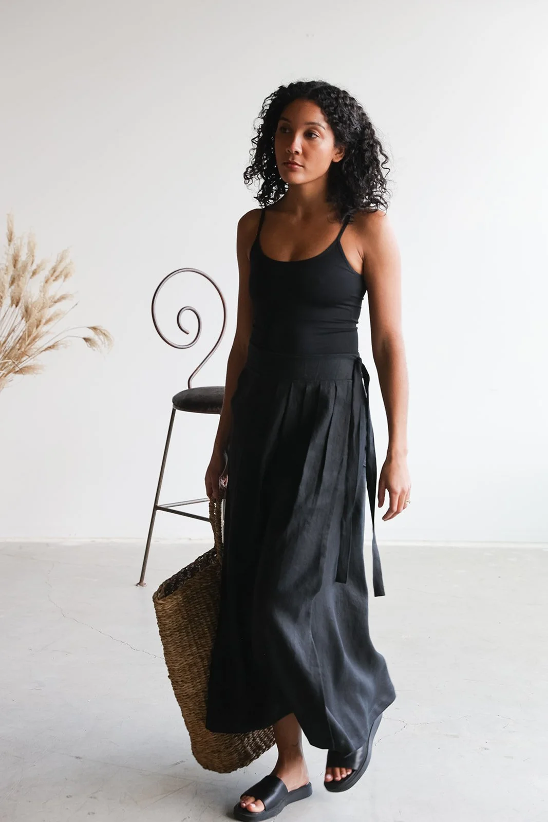 nomi-designs-linen-wrap-skirt-black-walk.jpg