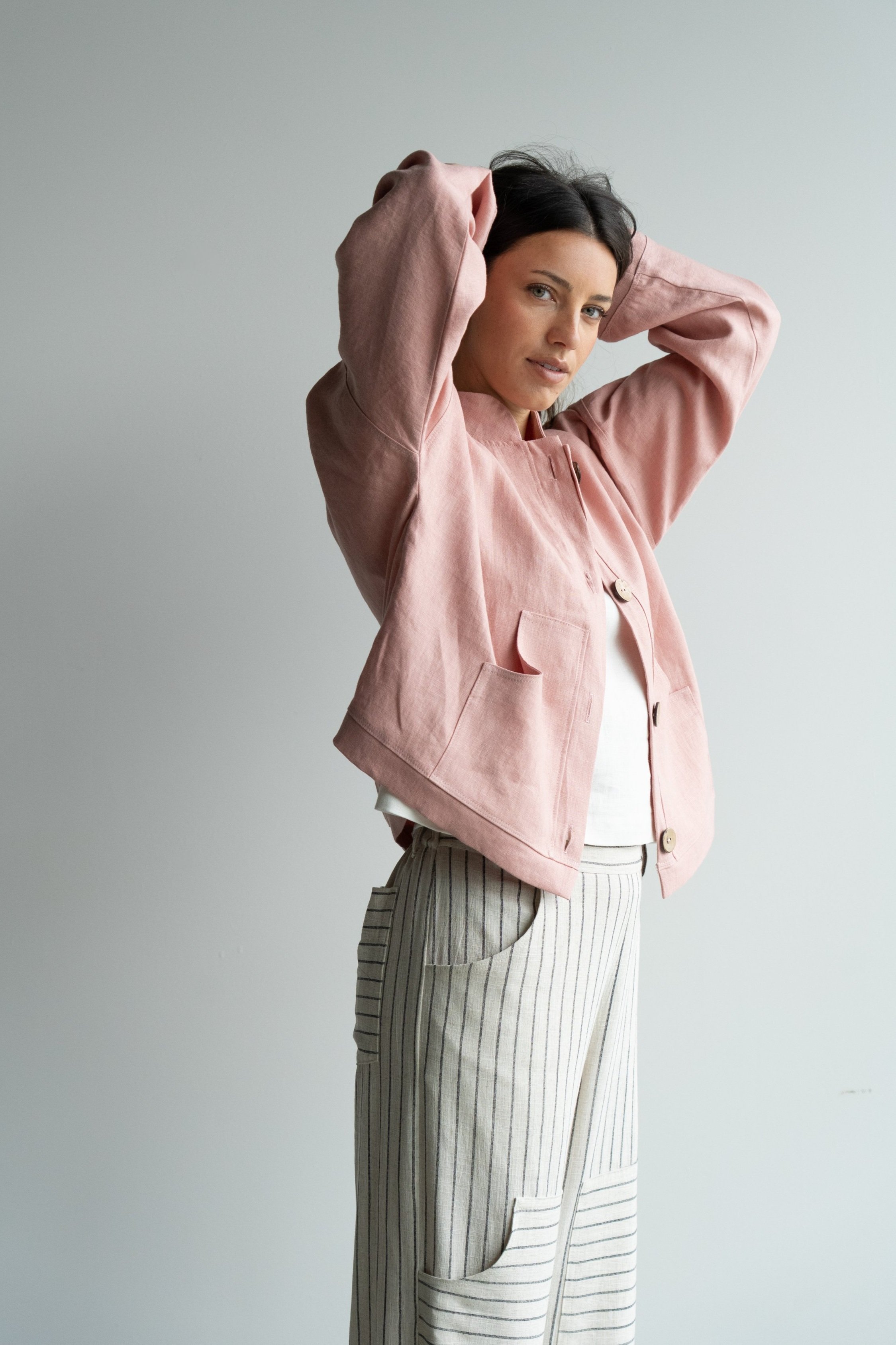 linen-jacket-pink-side-hands-up.jpg