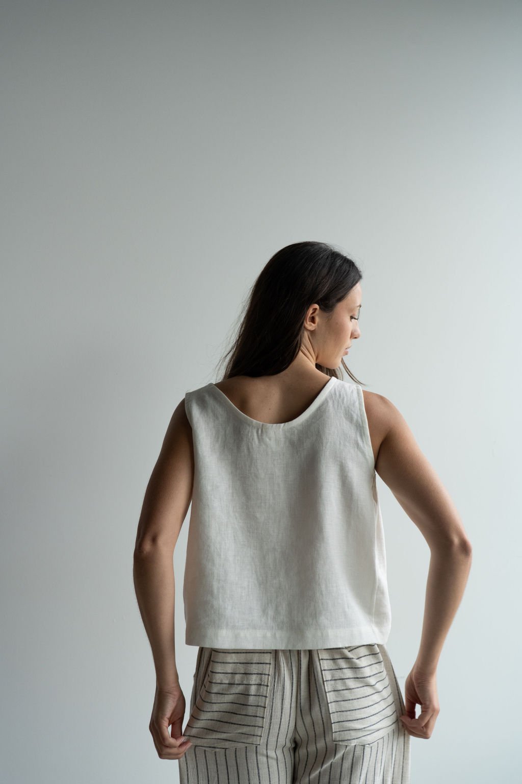 linen-tank-top-ivory-back-strips-pockets.jpg