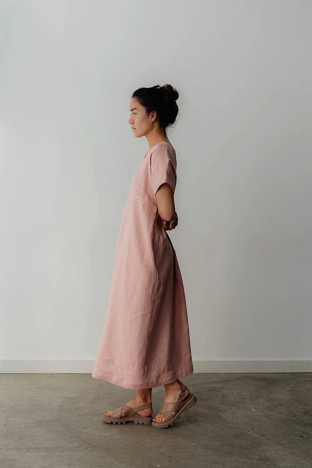 linen-dress-pink-side-hands-in-the-back.jpg