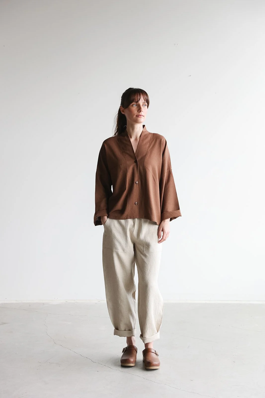nomi-designs-linen-pants-natural-shirt-cocoa-pocket.jpg