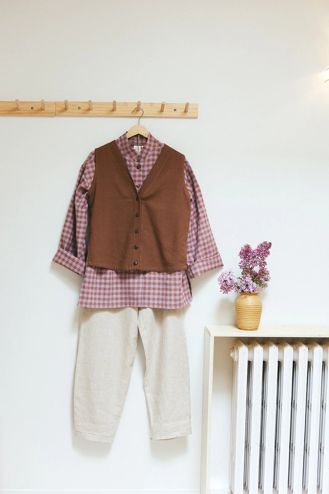 Nomi-designs-studio-vest-cocoa-shirt-gingham-pants.jpg