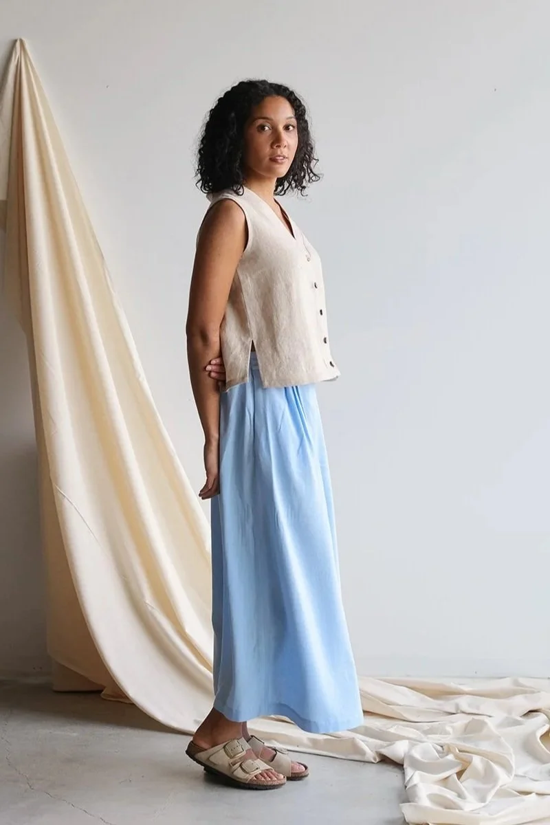 nomi-designs-linenvest-natural-skirt-sky-side.jpg