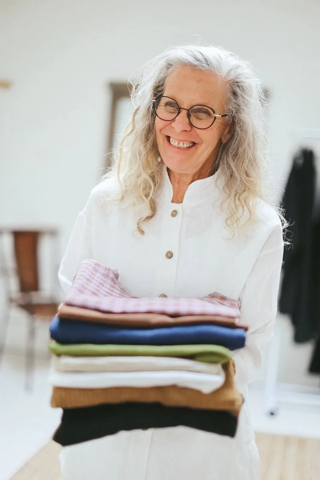 Nomi-designs-studio-linen-clothes-folding-linen-shirt-ivory.jpg