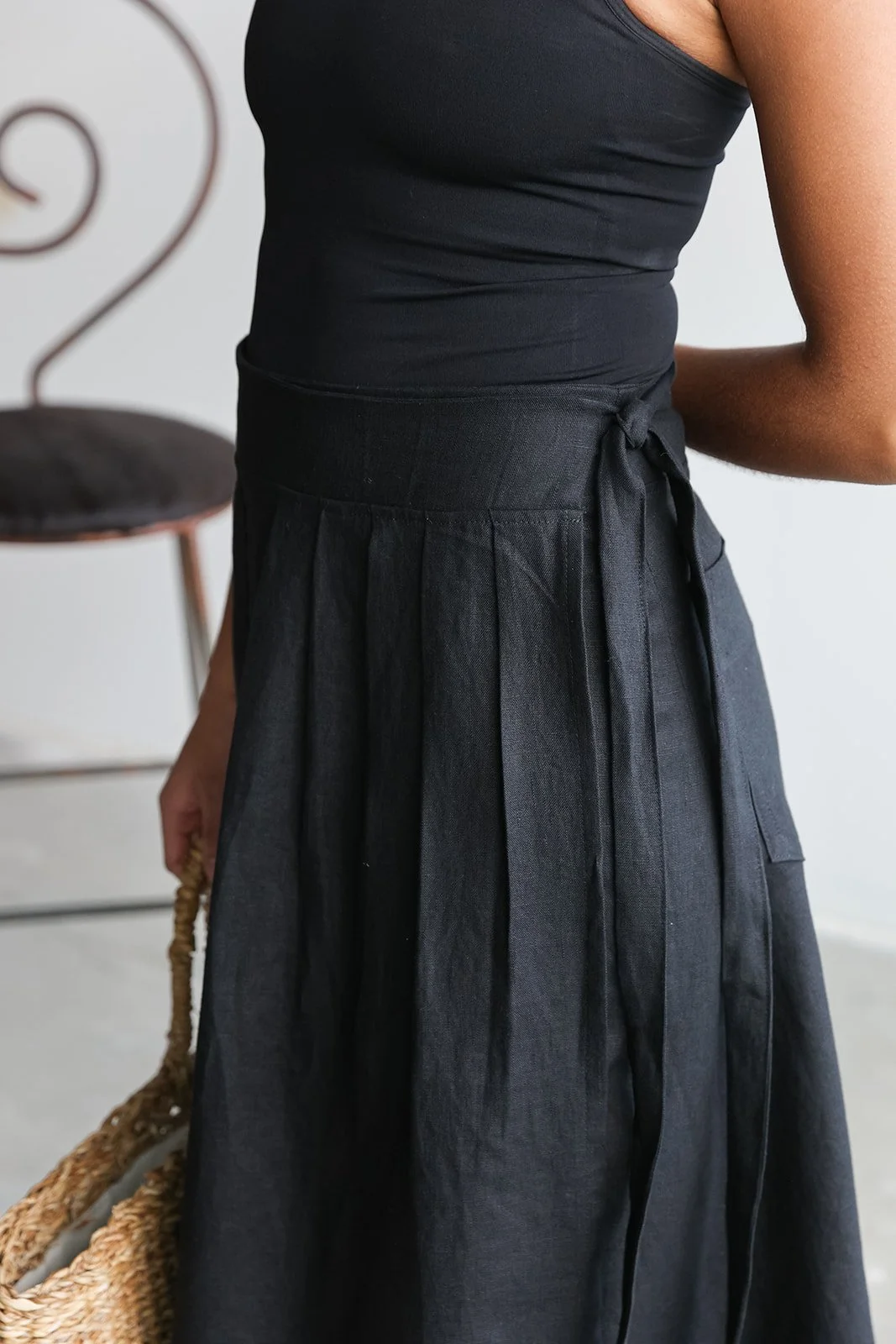 nomi-designs-linen-wrap-skirt-black-details-side.jpg
