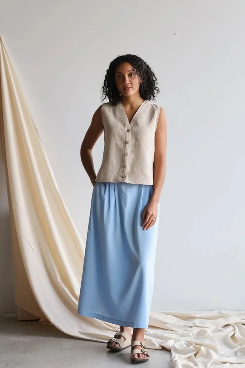 nomi-designs-linen-vest-natural-skirt-sky-front.jpg