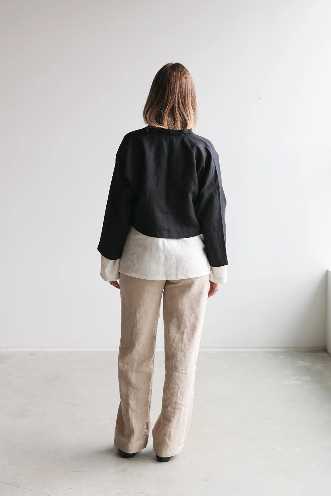 linen-wrap-top-black-ivory-shirt-natural-pants-back.jpg