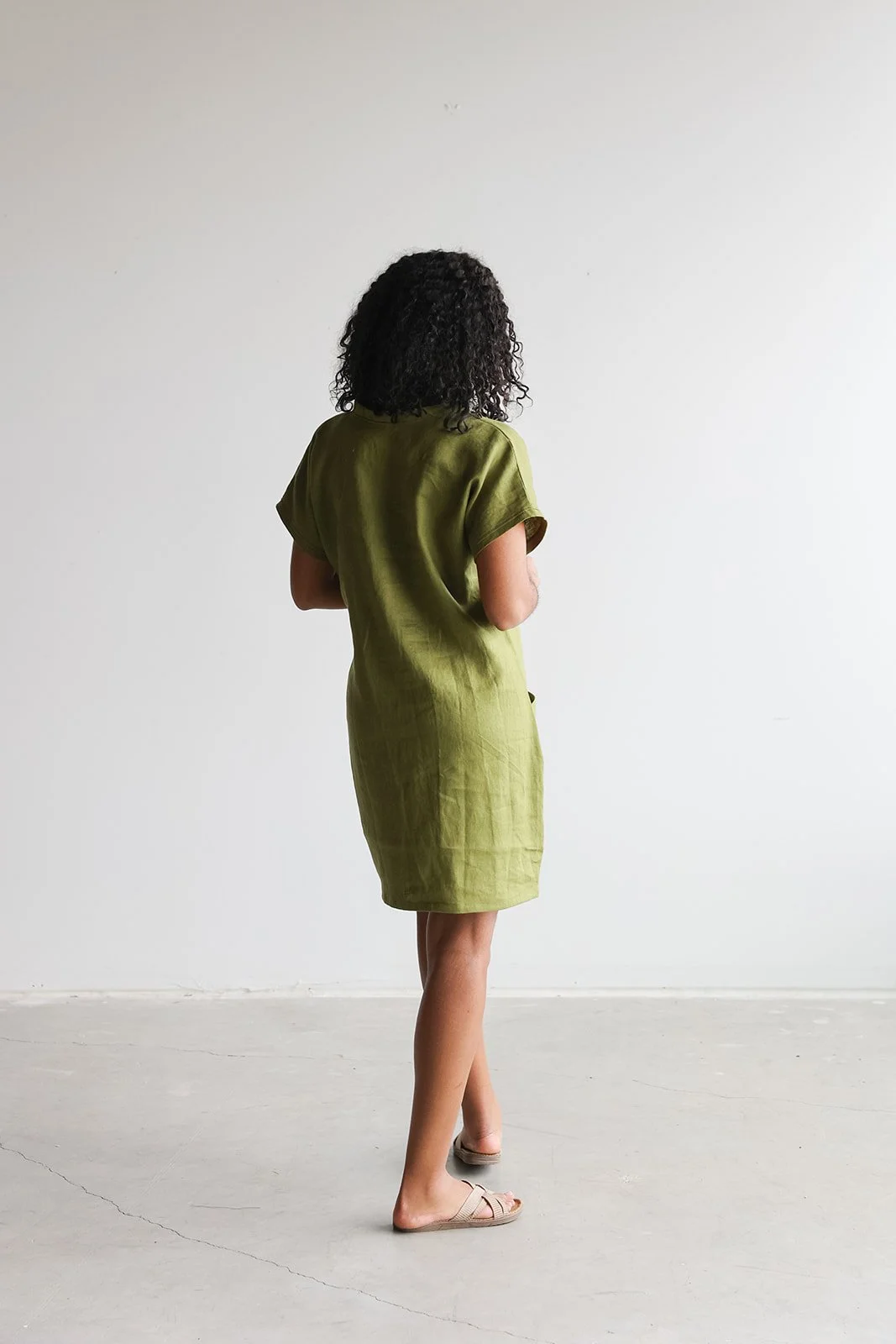 nomi-designs-mini-linen-dress-pesto-back.jpg