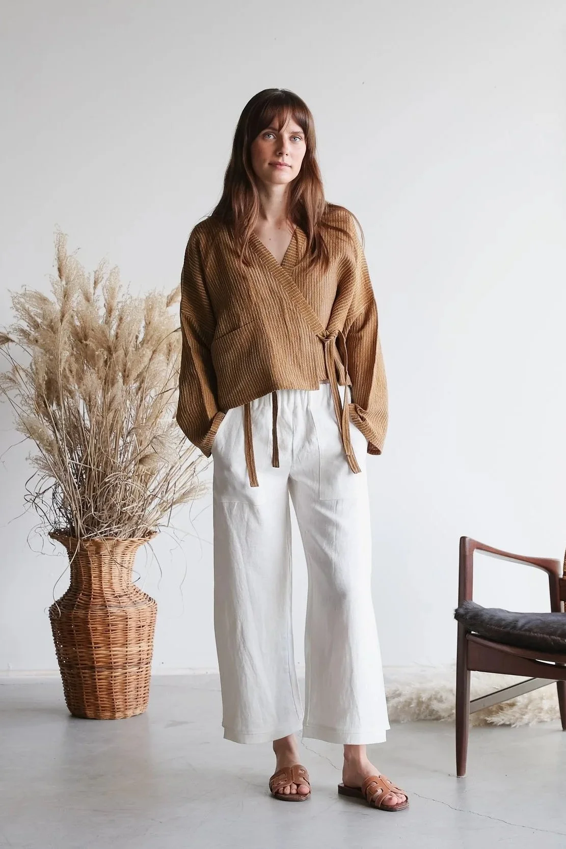 nomi-designs-linen-pants-ivory-wrap-top-ginger-front.jpg