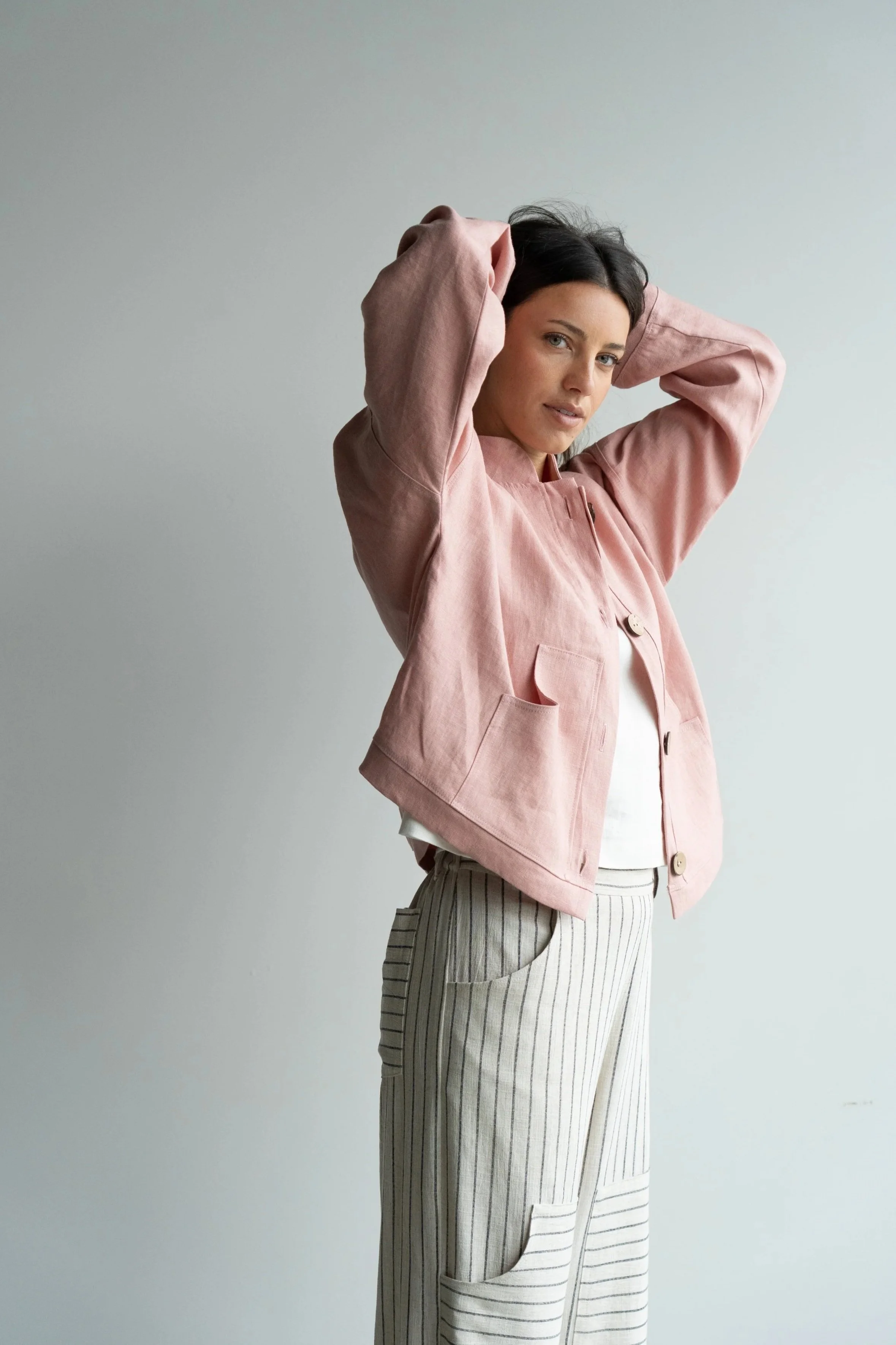 linen-jacket-pink-side-hands-up.jpg