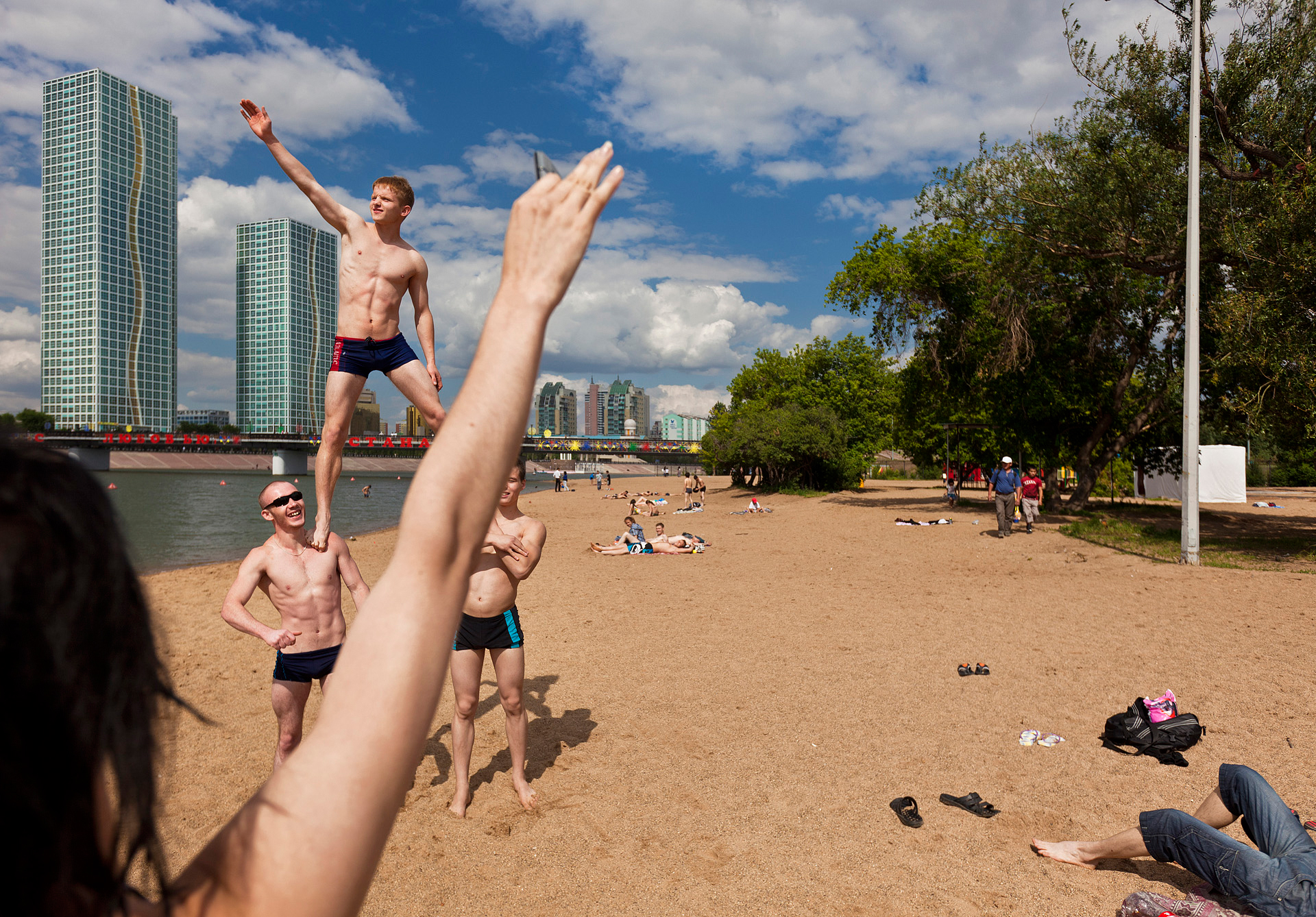  The French Riviera it isn't, but Astana makes the most of its brief summer, when young men gather at the Esil River to flex their muscles before appreciative members of the opposite sex.  Astana, Kazakhstan  