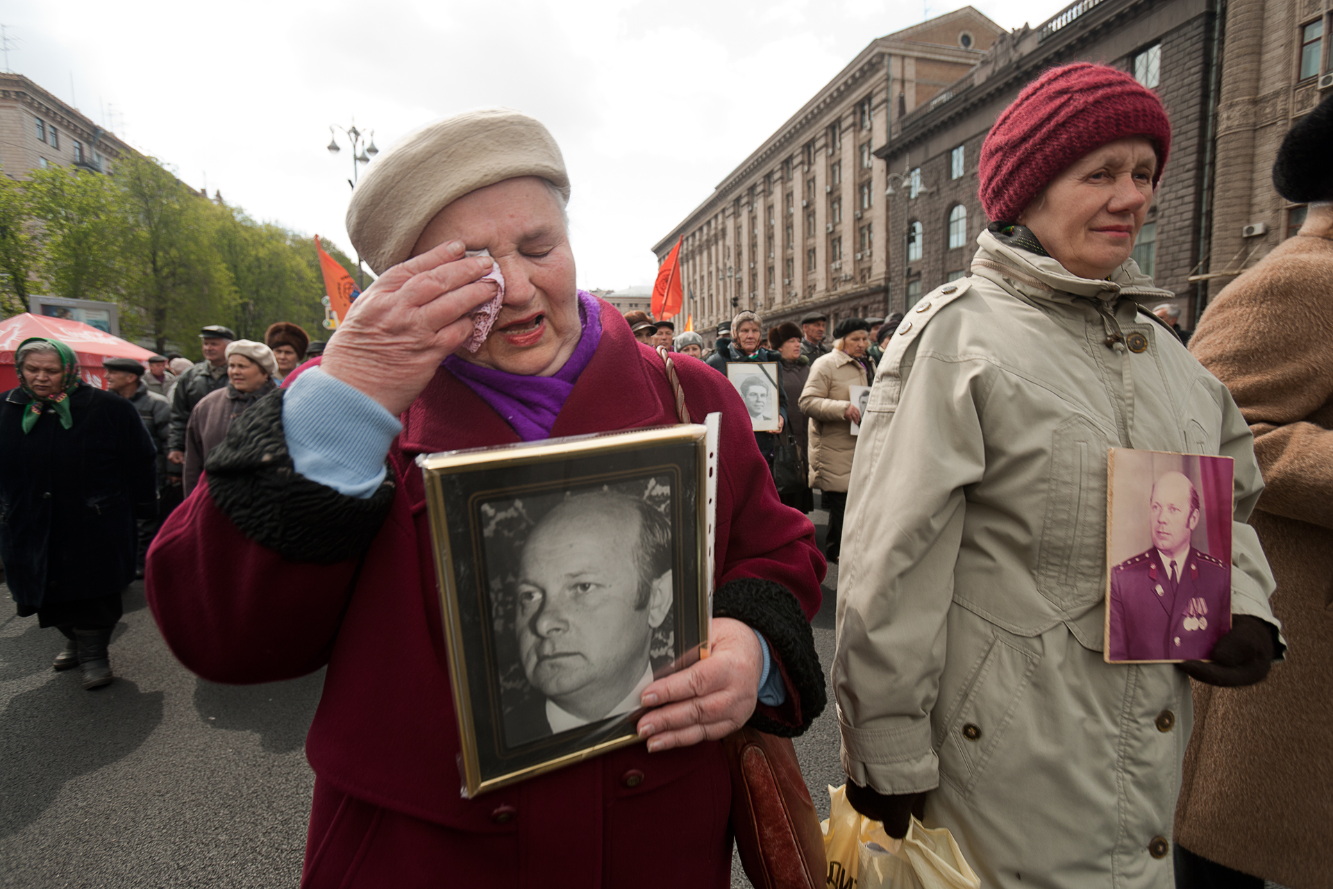 A group of women known as Chernobyl Widows carry photographs of their deceased loved ones during a 5,000 strong demonstration in Kiev on the anniversary of the Chernobyl accident.  Kiev, Ukraine  