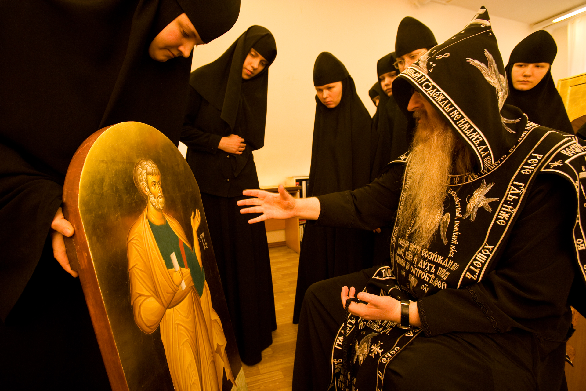  Judgment day arrives at Novo-Tikhvinsky cloister when Father Abraham sits down to critique icons painted by resident nuns.  Yekaterinburg, Russia  