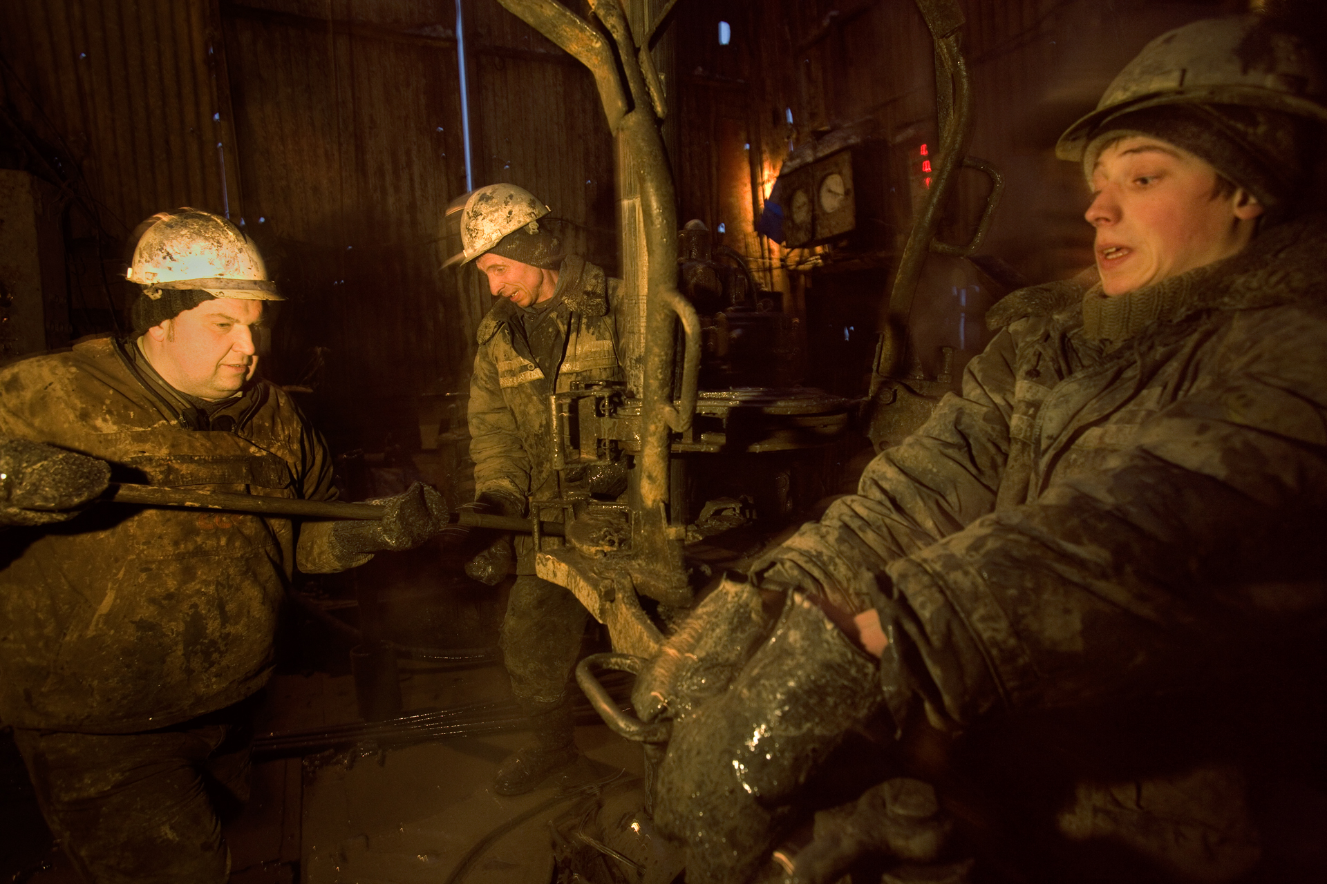  Workers on an oil rig for Surgutneftegas. The oil and gas company giant was among the first to start intensive exploration in Siberia.  Fyodorovsky oil field, Russia  