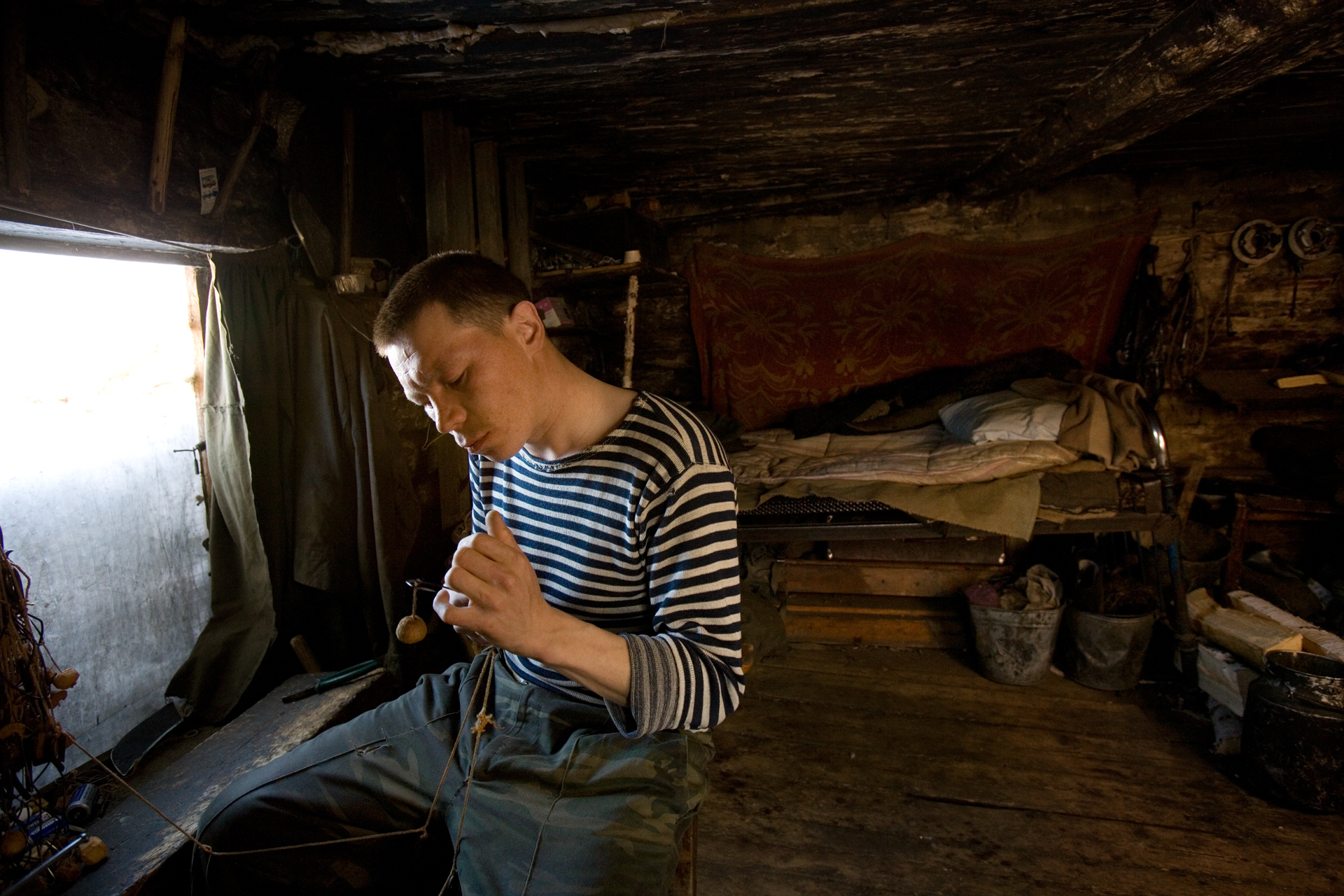  Interior of a young, unemployed Mansi’s hut in a settlement in the Khanty-Mansiysk region.  Near Saranpaul, Russia  