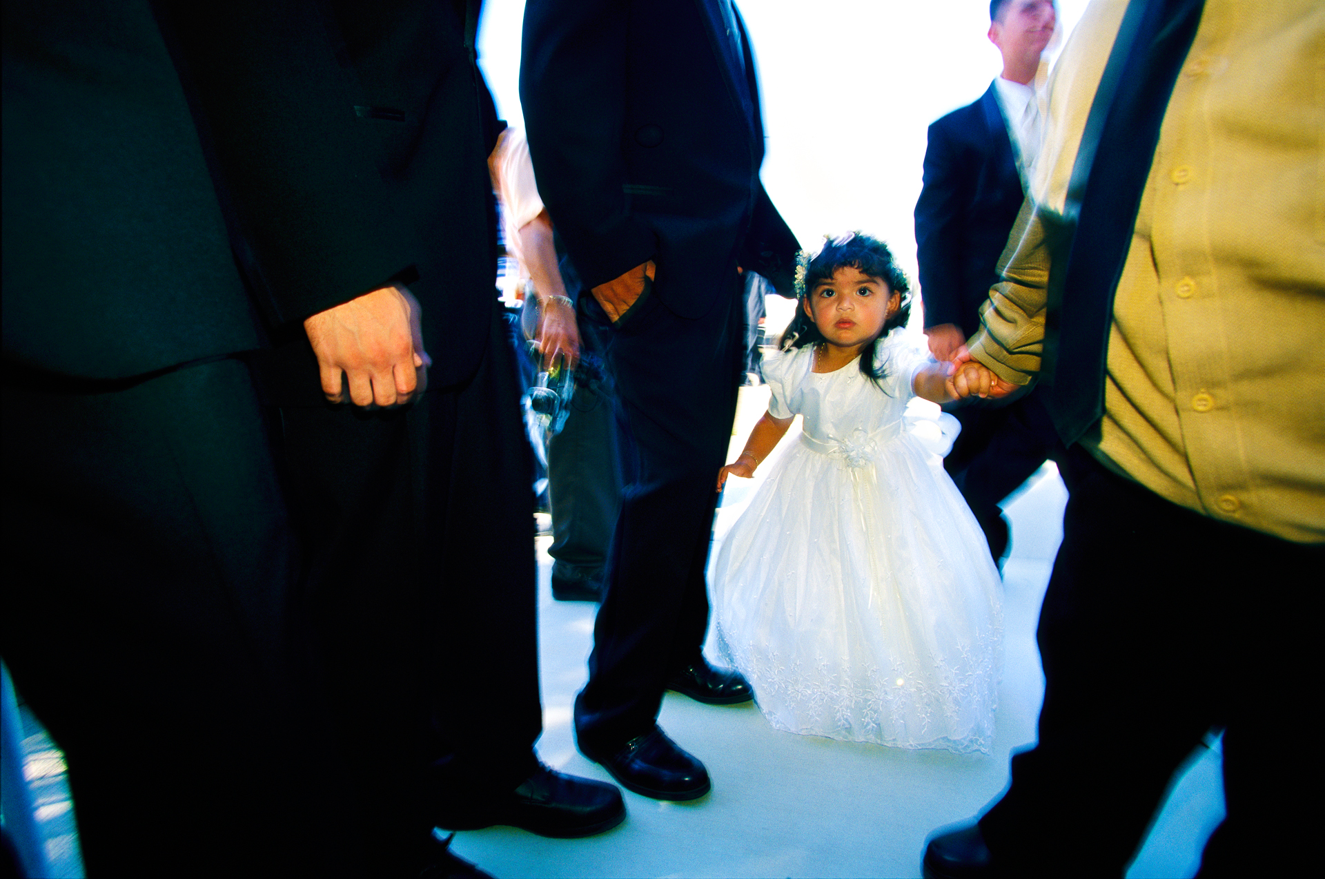  This little girl is headed for her aunt's quinceañera, a Hispanic rite of passage for Latina girls turning 15.  Niland  