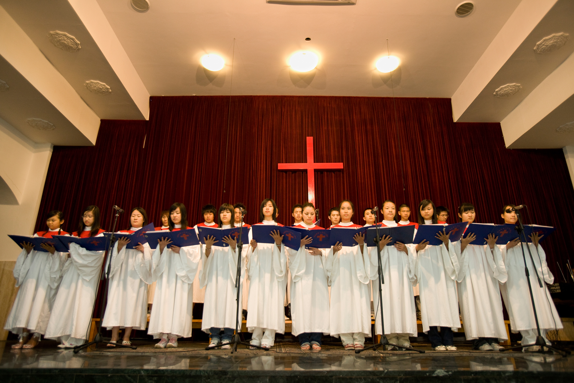  Chinese parishioners gather for service, including choir performances, at a Christian church in Prato. 