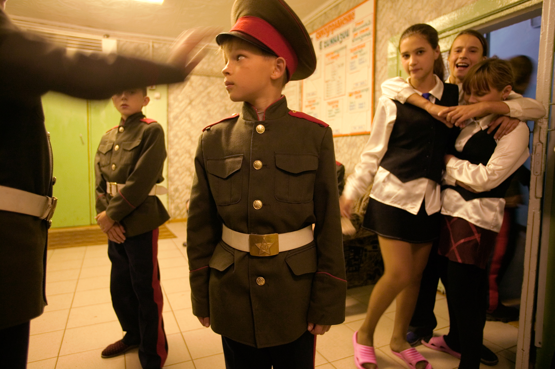  Descendants of the first wave of Siberian conquerors, young Cossacks in Yeniseisk gather in their dorm hallway.  Yeniseisk, Russia  