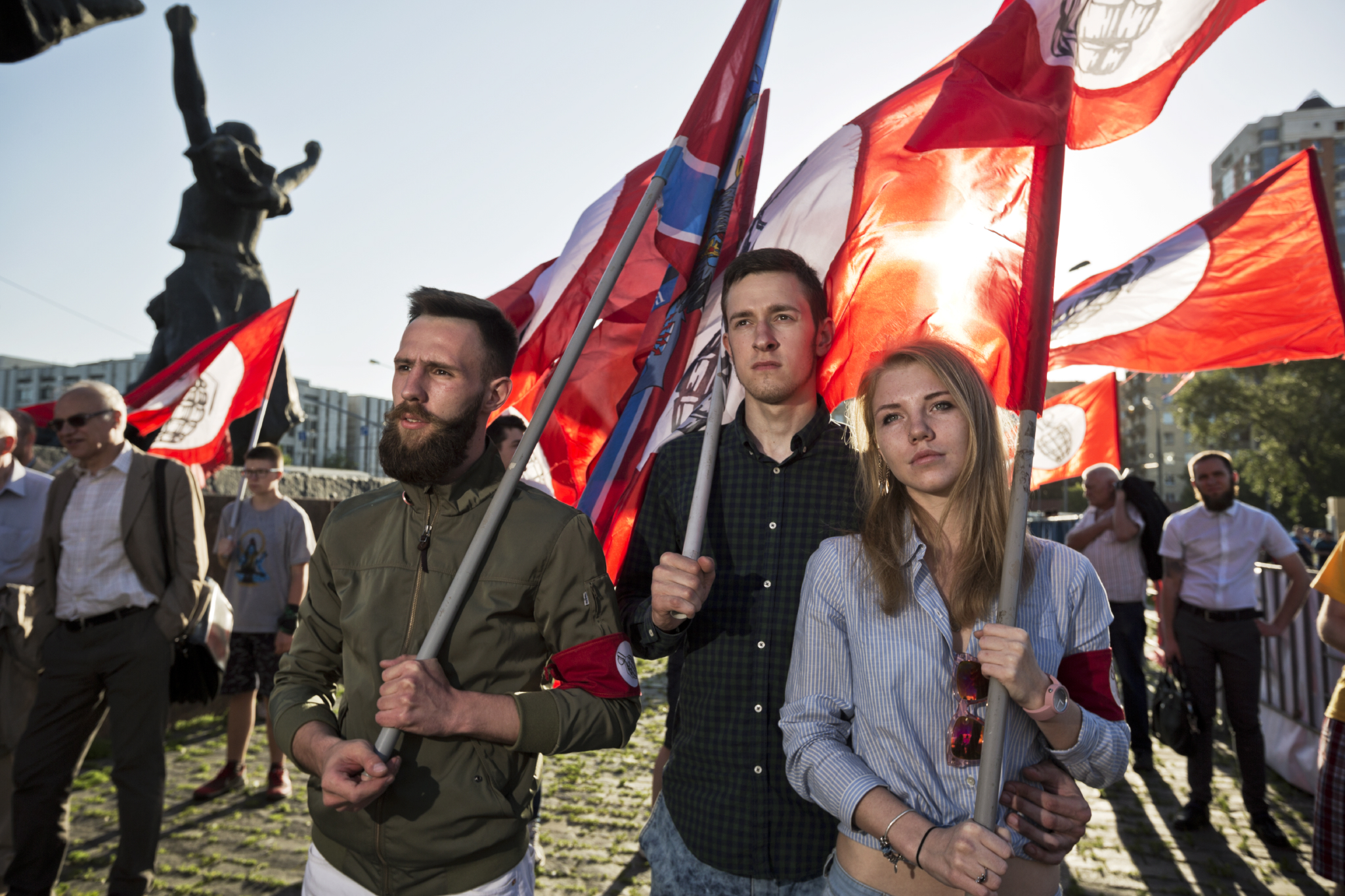  Kostya , 21, and his girlfriend Anastasiya, 20, supporters of the Other Russia, an opposition party, rally in Moscow displaying flags and armbands with their symbol, a grenade. The Other Russia was formed by members of a banned ultranationalist poli