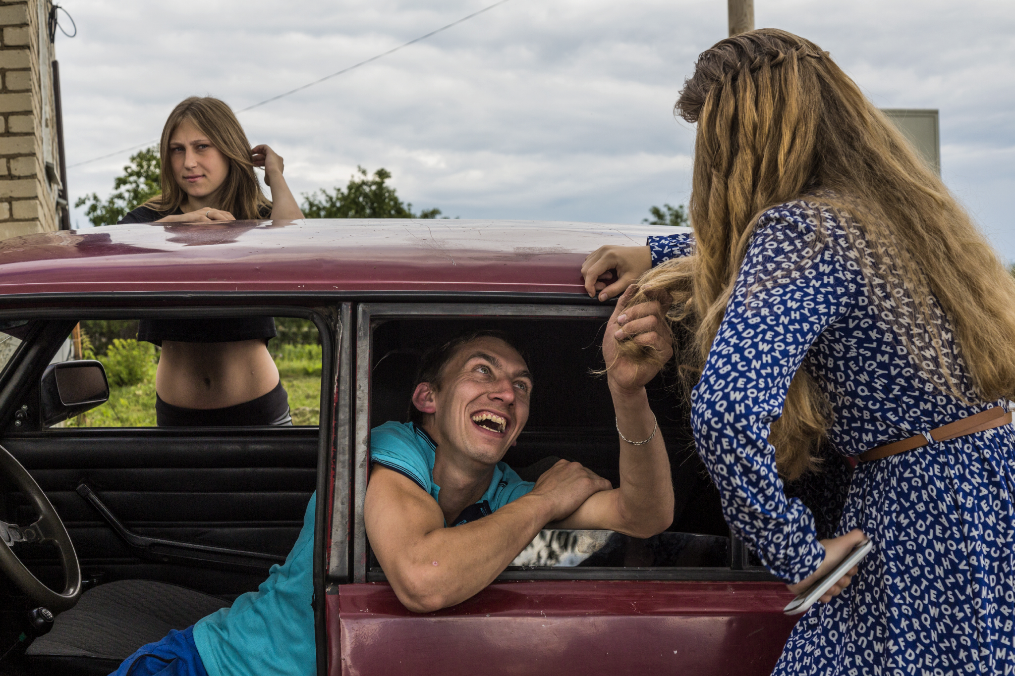  Before the "Day of the Village" celebration, young people in Nikolskoyedo do what young people do everywhere when entertainment is sparse: hang out and flirt. Until recent downturn, the century's oil-fueled economy expanded rapidly, and Russia's you