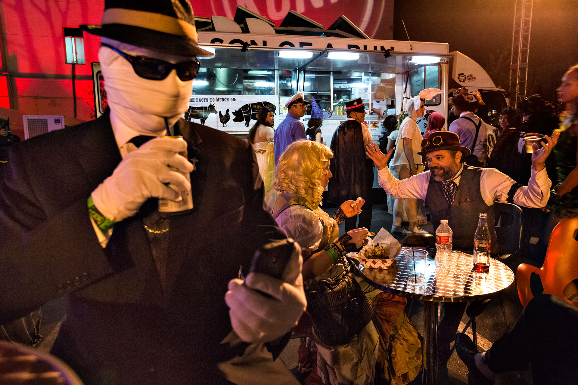  Halloween partiers enjoy freshly made meals from food trucks at public radio KCRW’s annual masquerade ball. The fundraiser features several bands and is held on the grounds of the LA Park Plaza hotel. Special events guarantee customers – and cash – 