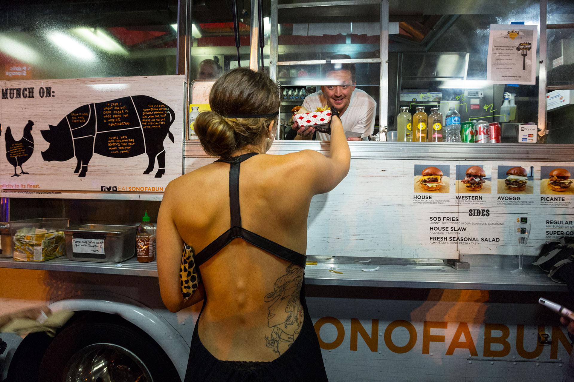  Food trucks attract all segments of society in Los Angeles.  Los Angeles, CA.  