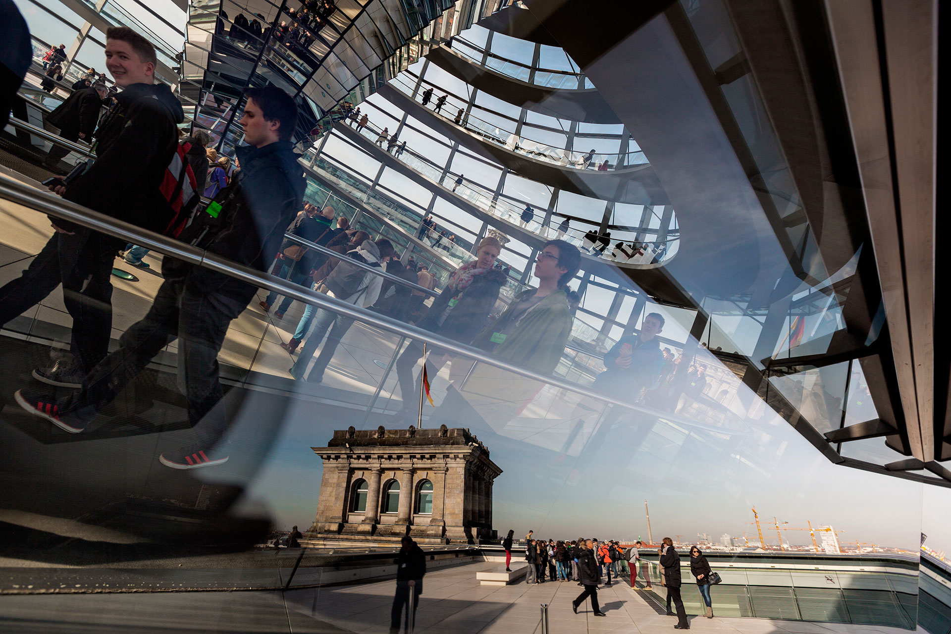  In the 1990s, British architect Norman Foster restored Germany’s 1984 parliament building, the Reichstag, damaged in World War II. He added a central glass dome to symbolize transparency.  Berlin, Germany.  