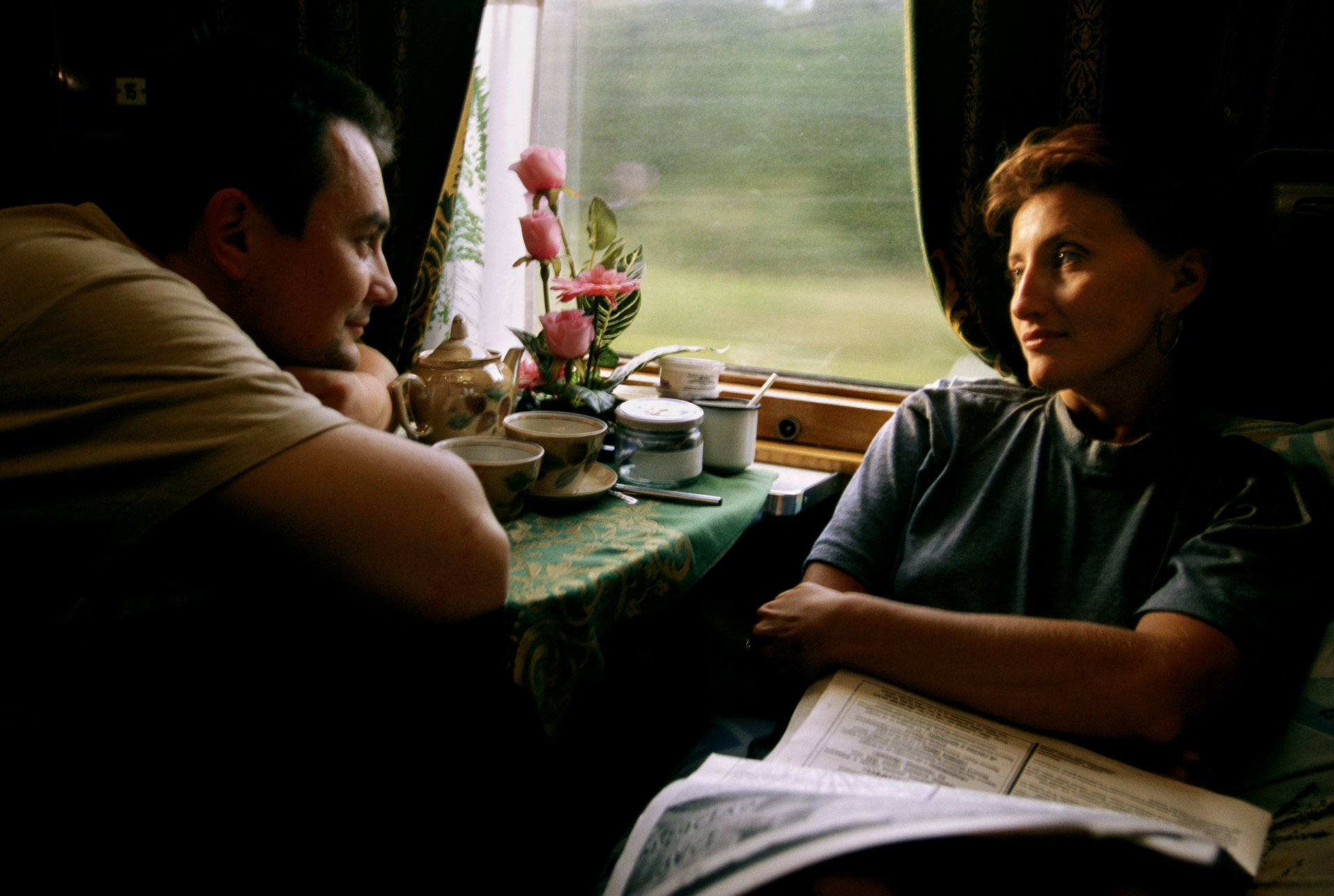  A couple who met aboard the Trans-Siberian savor a first-class moment together.  The Urals, Russia  