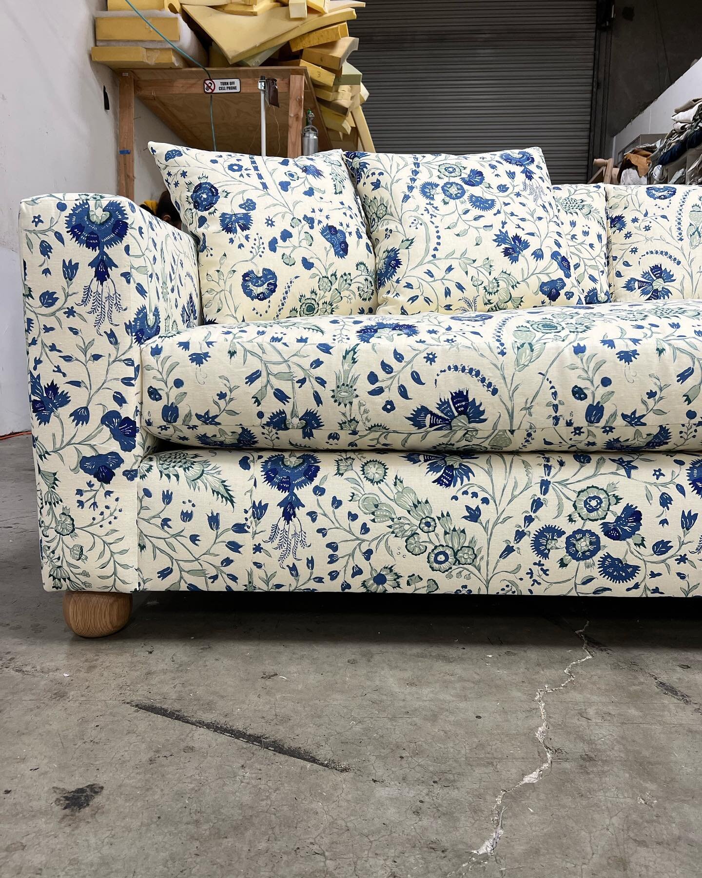 This beauty of a sectional brightened up the workroom and we are all sad to see if head out of state for the super creative team at @emilyjanakinteriors 
The fabric, the bun feet, just everything!