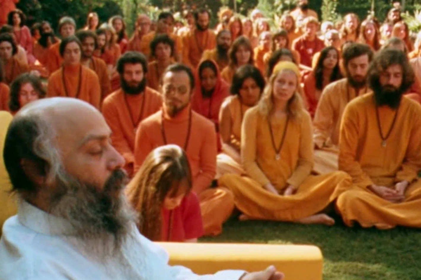 Bhagwan and sannyasins. Photo: Netflix 