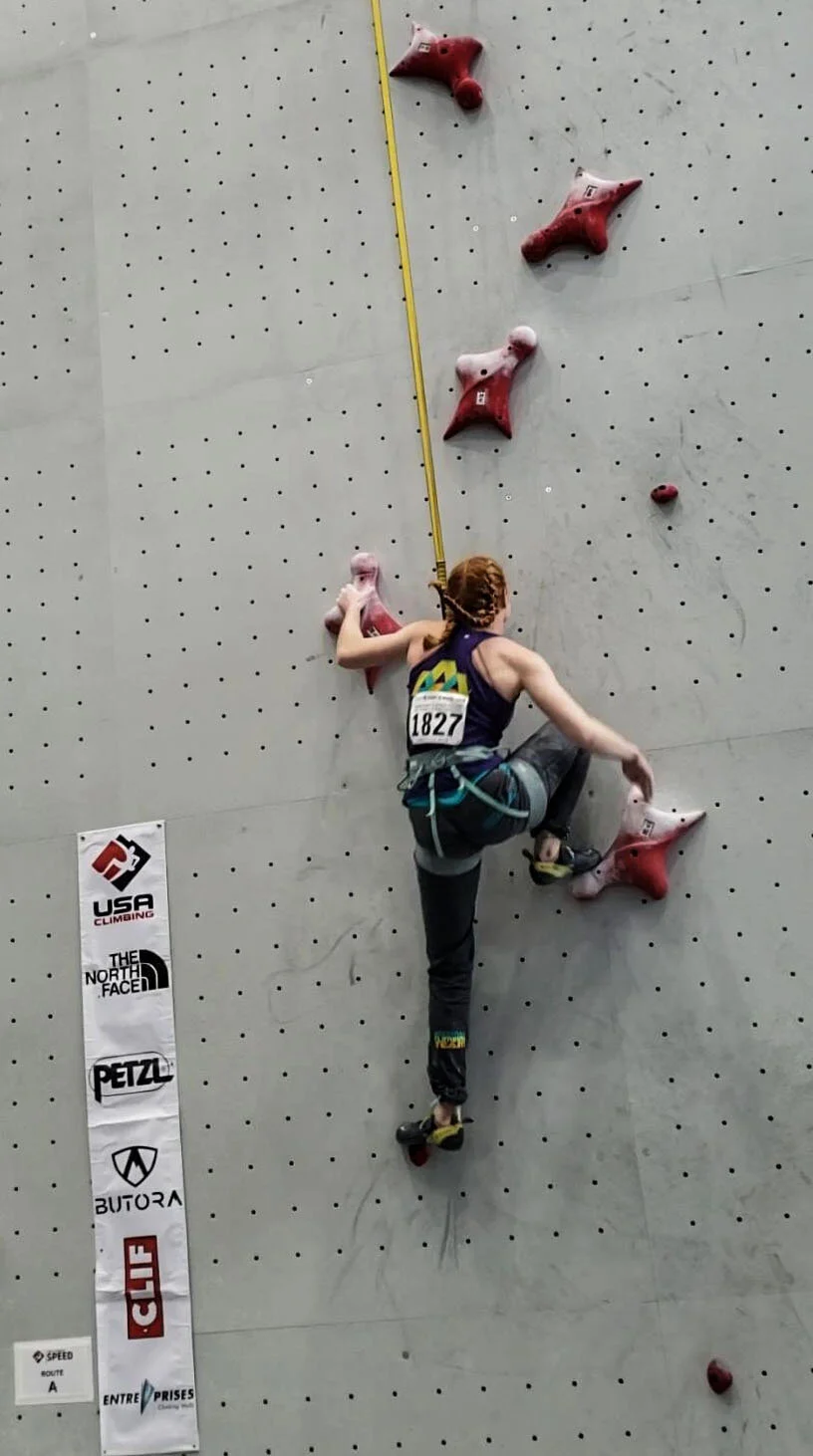 Aubrey speed climbing at Nationals.