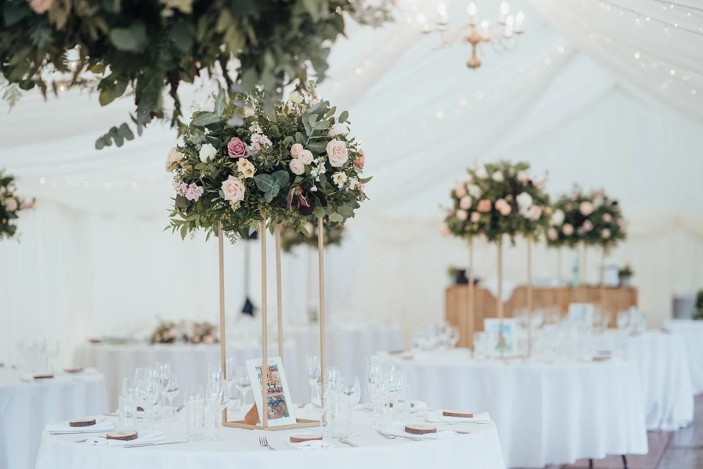 Tall table centres. I LOVE. I always say to couples see over or through a table centre arrangement. Being 5ft it&rsquo;s fun getting these up but so worth it! 

Gorgeous blush, ivory with a pop of burgundy flowers in an abundance of greenery.