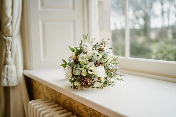 Bouquet.

Detail, is exactly what Tara does 🙌🏽. She new exactly what she wanted and what style she wanted. 

We had pine cones in Feb 🤍. The anemones and poppies opened perfectly for the ceremony. Captured by @marcmillar 
Venue @archerfieldhouse