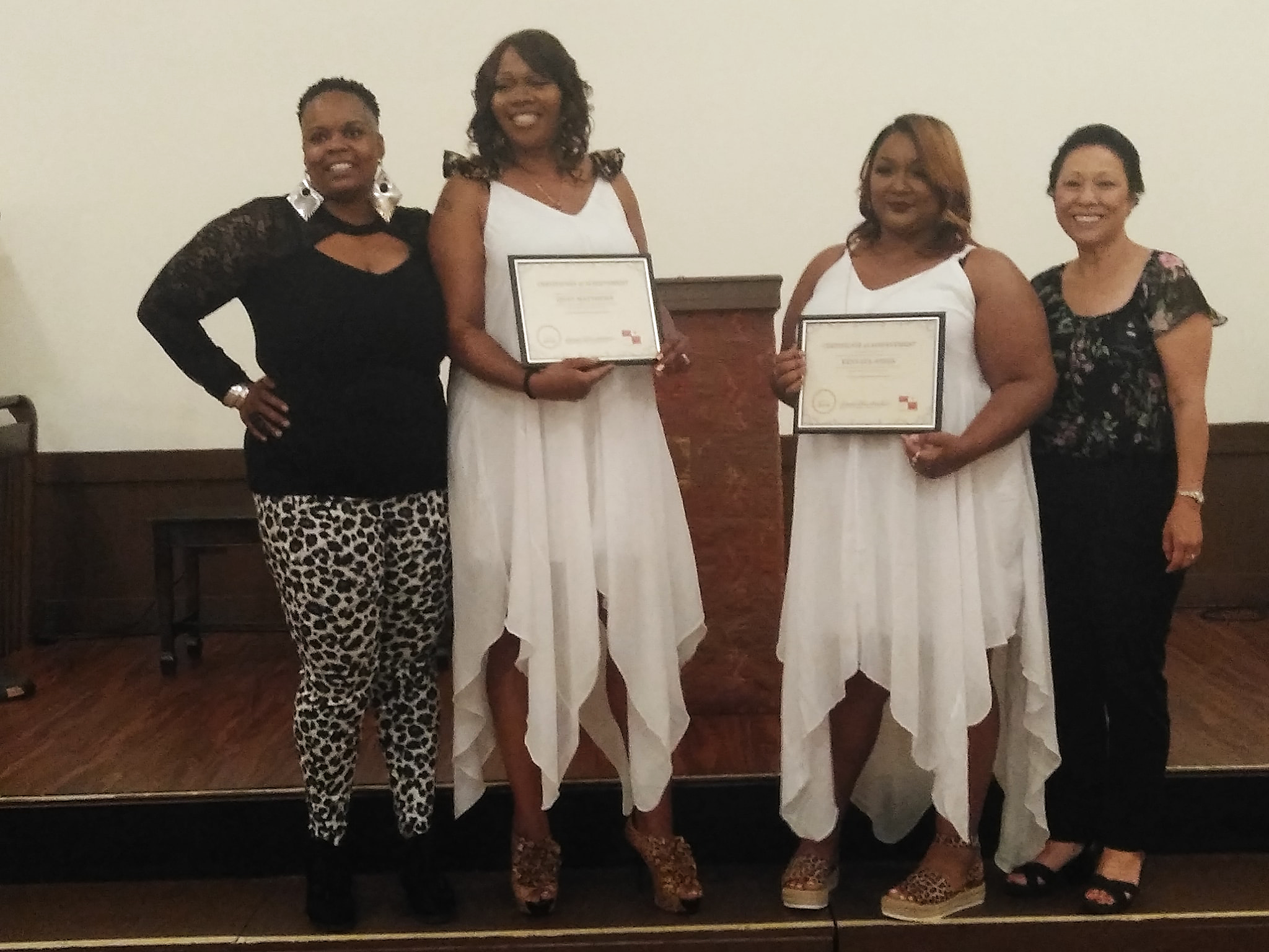 Founder & President Shannon Olive with Portland Commissioner Lori Stegmann and the two July graduates of the “I Love Me” Women’s Empowerment group, Quay Matthews and Kenyata Jones. .