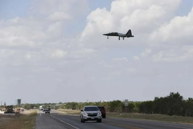 An U.S. Air Force T-38 Talon flies over U.S. 90 during a training flight.  Photo: Jerry Lara /San Antonio Express-News