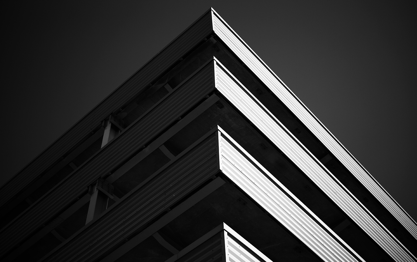 I tend to look for simple, geometric shapes that collide with highlights and shadows.