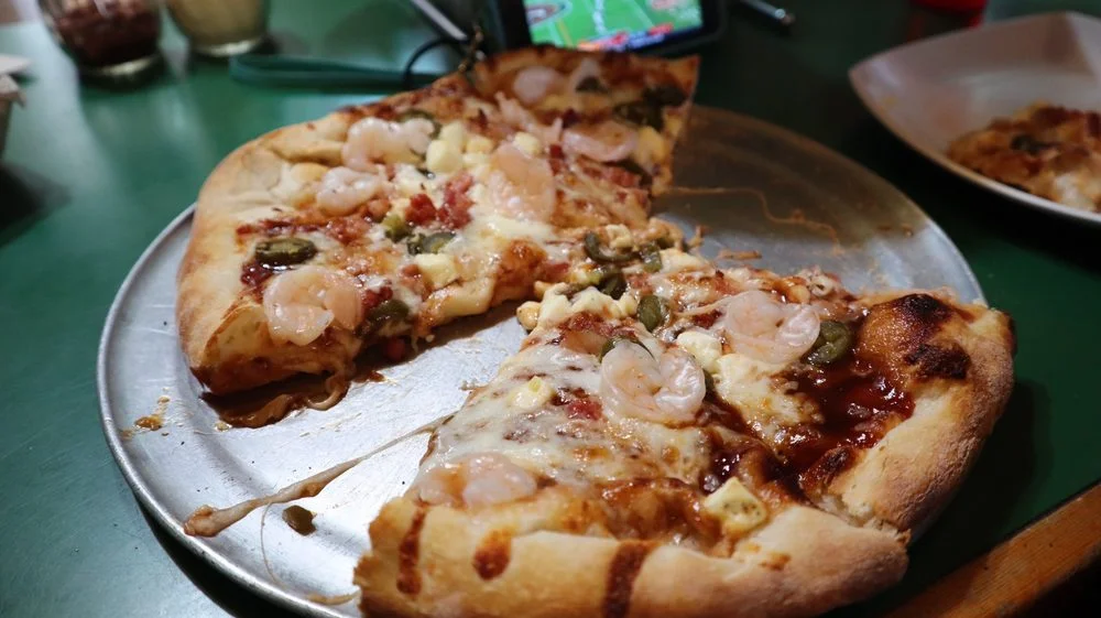 Crocodile (the Leadville favorite) - BBQ base with mozzarella, jalapenos, bacon, cream cheese cubes, and shrimp