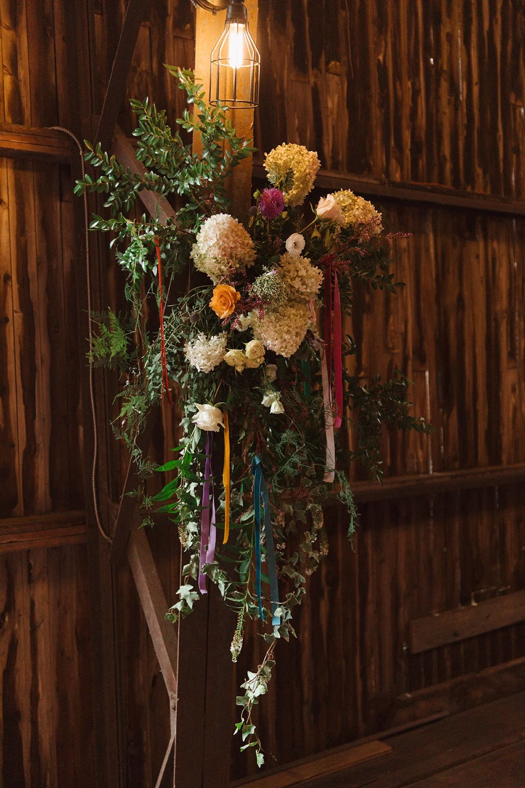 Floral Install on Barn Trusses