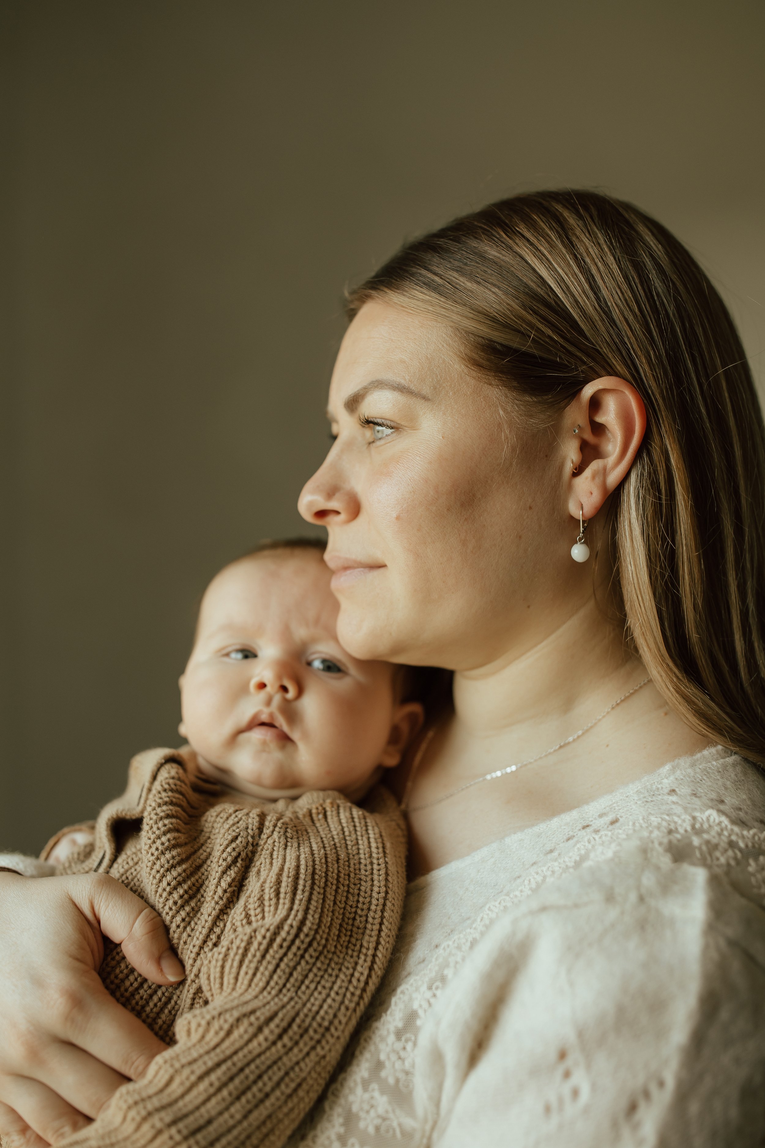 Woman wearing sterling silver Pearl Drop Earrings with lever backs