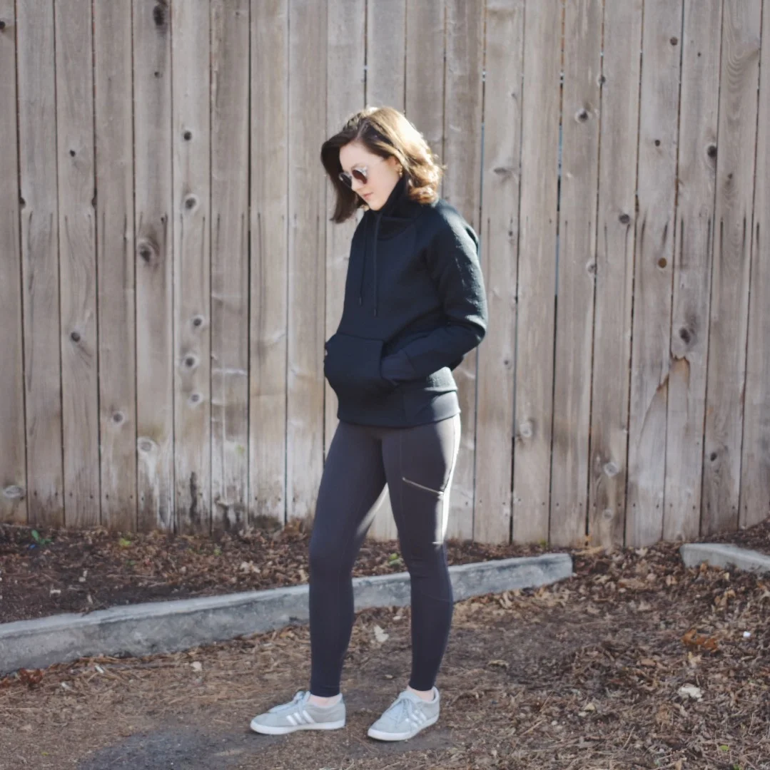 This isn't just your regular pullover. There's texture and design, the fabric is soft, and it has a cool structure. I've paired it with my favorite Athleta leggings (that have working pockets, those zippers are not just there for show), and my go-to Adidas sneakers. {they are so worn out that I didn't even take an up-close pic of them.} I've add some earrings and curled my hair to help dress up the look, just a little bit. I can also pair the pullover with jeans and instantly I've gone from athletic leisure to casual wear. 