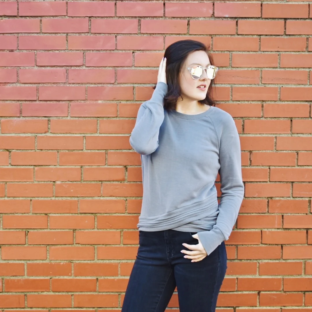 My next look is slightly less athletic leisure and more casual, however, the feel of it is definitely more leisurely. This top is from Athleta and the material is extremely soft. It's also thick enough to be considered a sweater. My jeans are from Madewell and they are so comfy, I could sleep in them. They are stretchy and high waisted--seriously these are my power jeans. I wear them all of the time because they are so comfortable. 