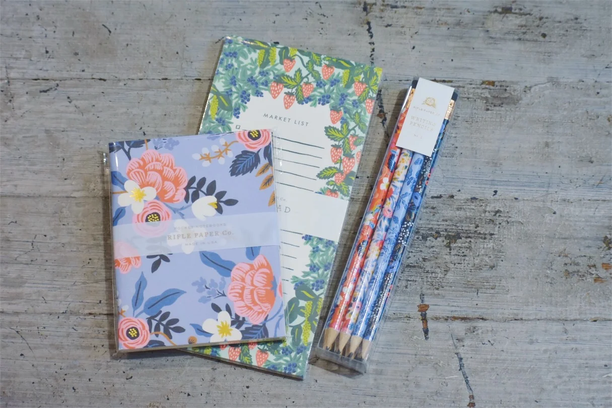 Fun notebooks, pencils, and a market list notepad are musts to help keep you not only organized, but also your desk bright and colorful!