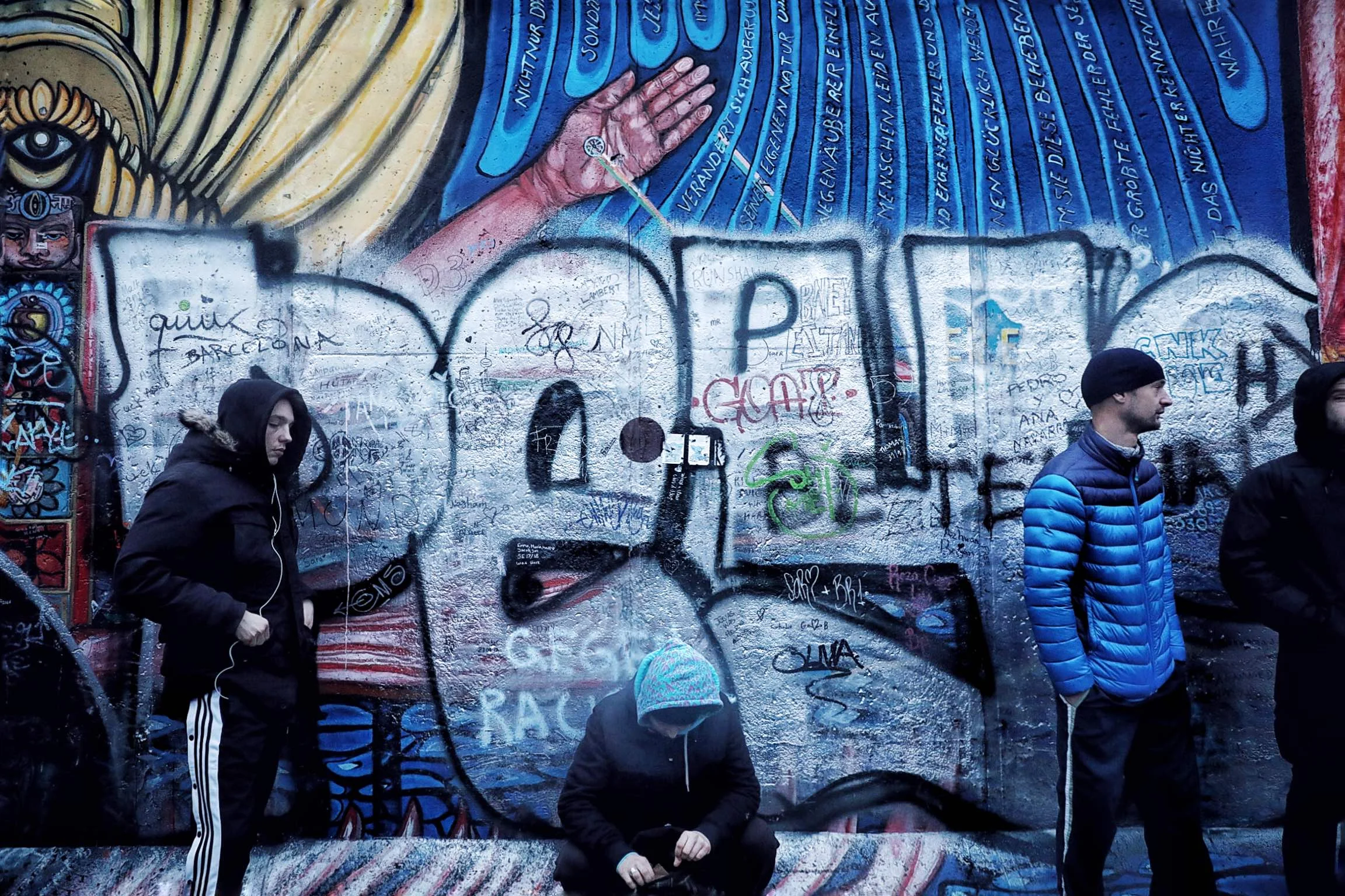 Berlin Wall Three Men Waiting For Bus.jpg