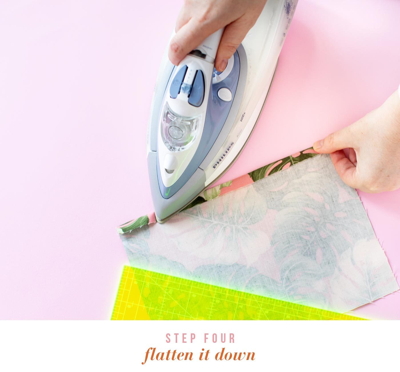 Whip out the iron. Fold back one edge of the material by 1cm and iron flat.