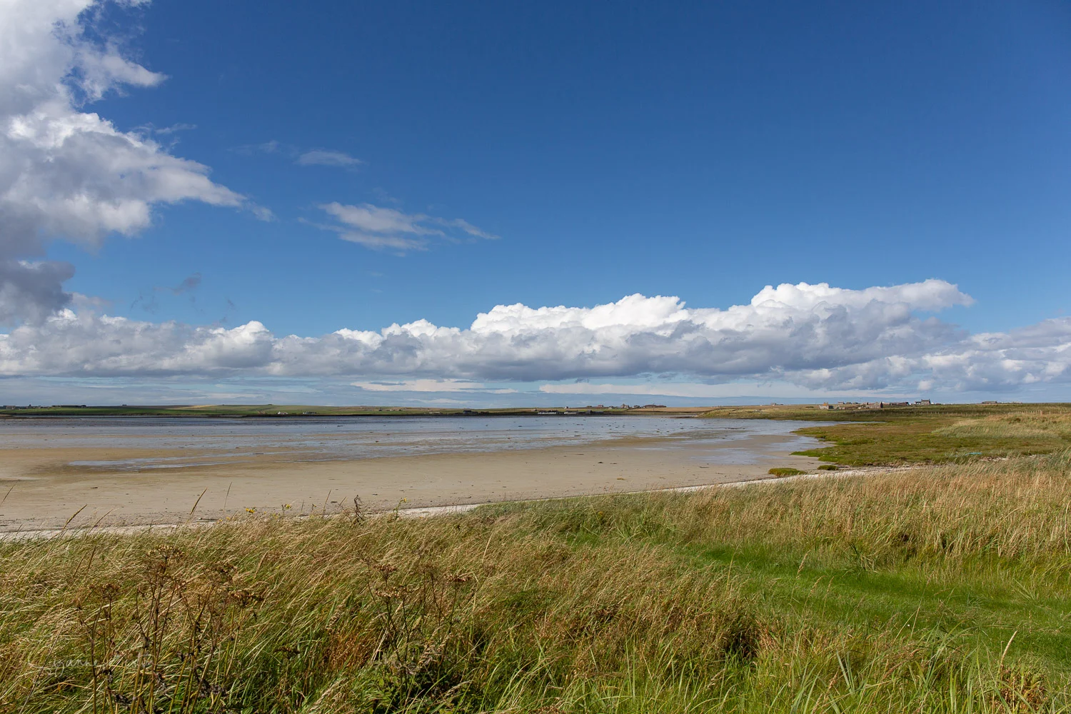 The Peedie Sea is located on Sanday and becomes at large sandy bay at low tide.