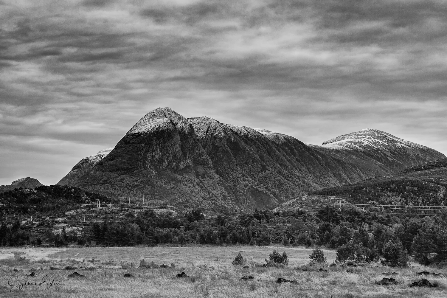 Innerbergsalen and Storøra on the island of Stabben in Norway dusted in snow