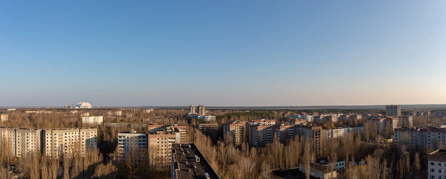 Pripyat City with the nuclear power plant and Duga Radar System in the distance
