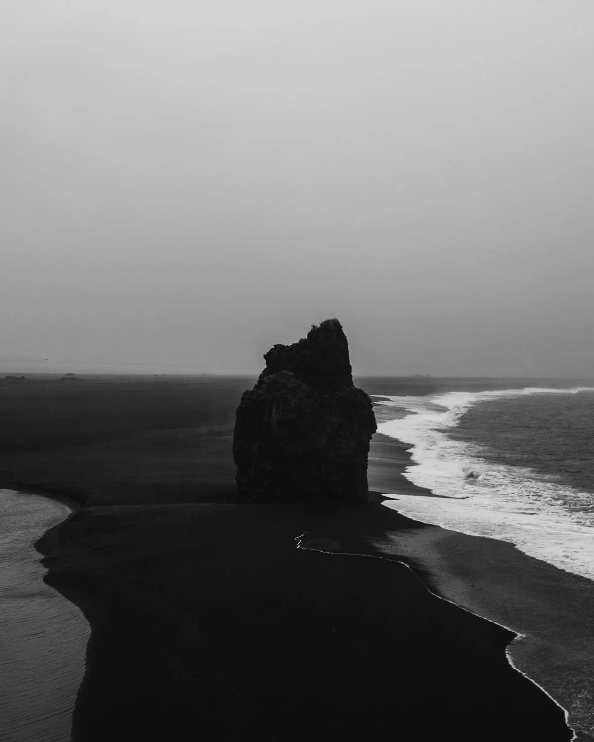 Kirkjufjara Beach in Iceland in black and white