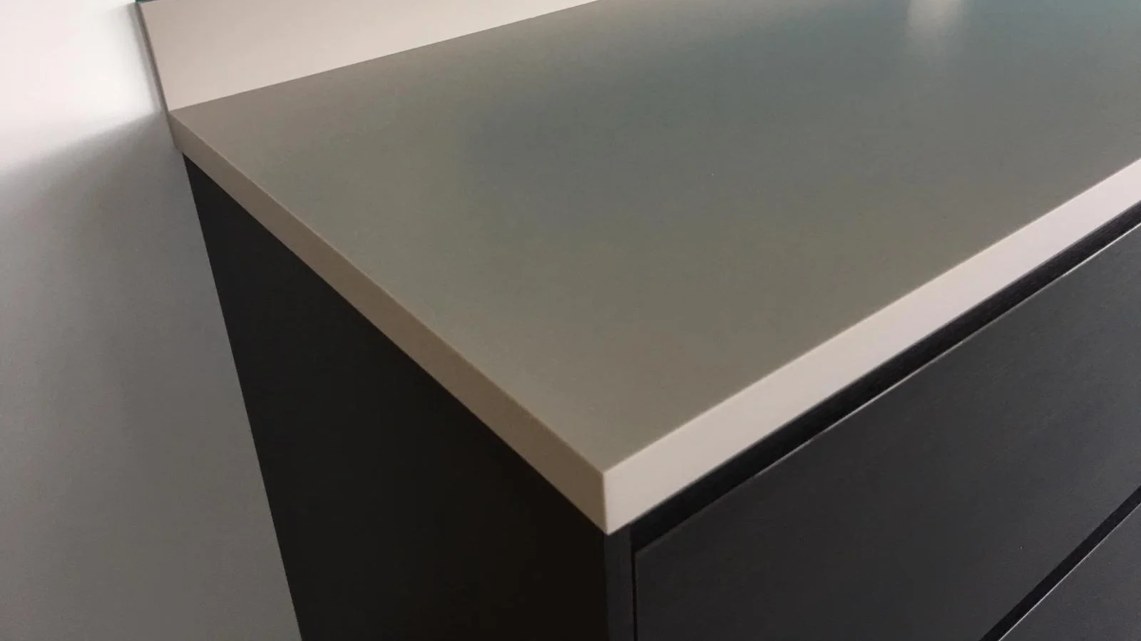 Custom made Corian worktop for kitchen units. 