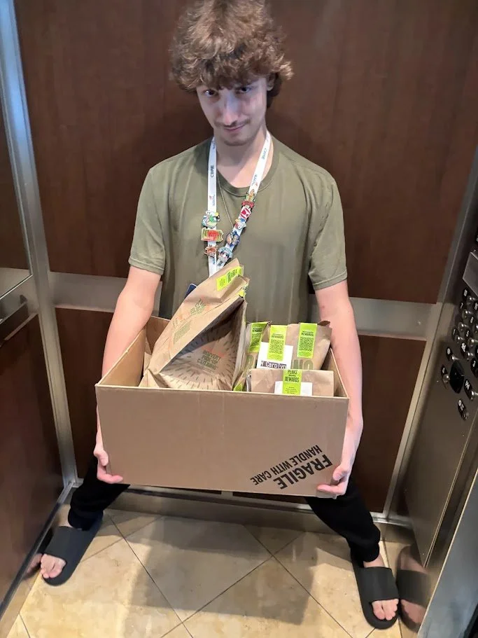An important job -- bringing Door Dash Dinner to the LCCTC Team